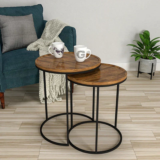 Sheesham Wood Nesting Tables, Set of 2 – two round tables beside an armchair