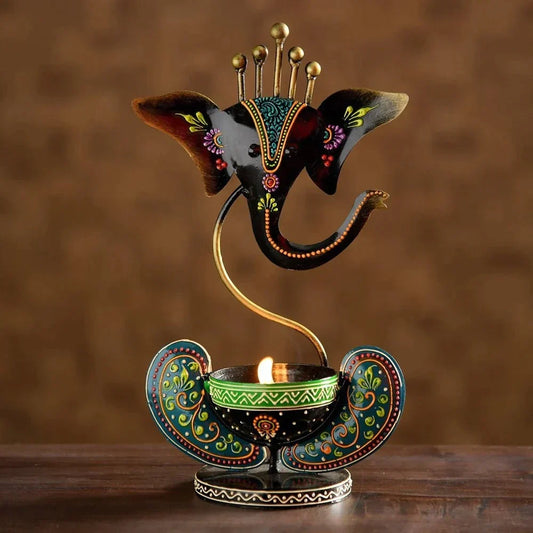 Multicolour Ganesha Tea Light Holder – black multicolour Ganesha holder with lit candle
