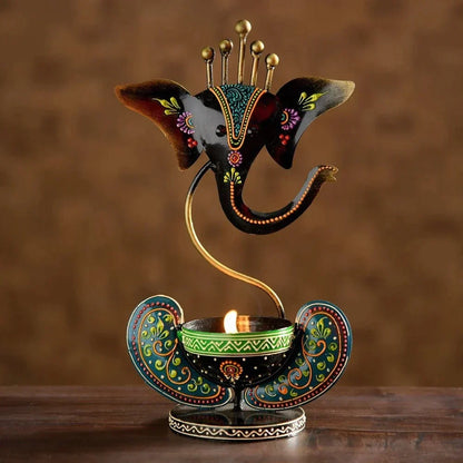 Multicolour Ganesha Tea Light Holder – black multicolour Ganesha holder with lit candle