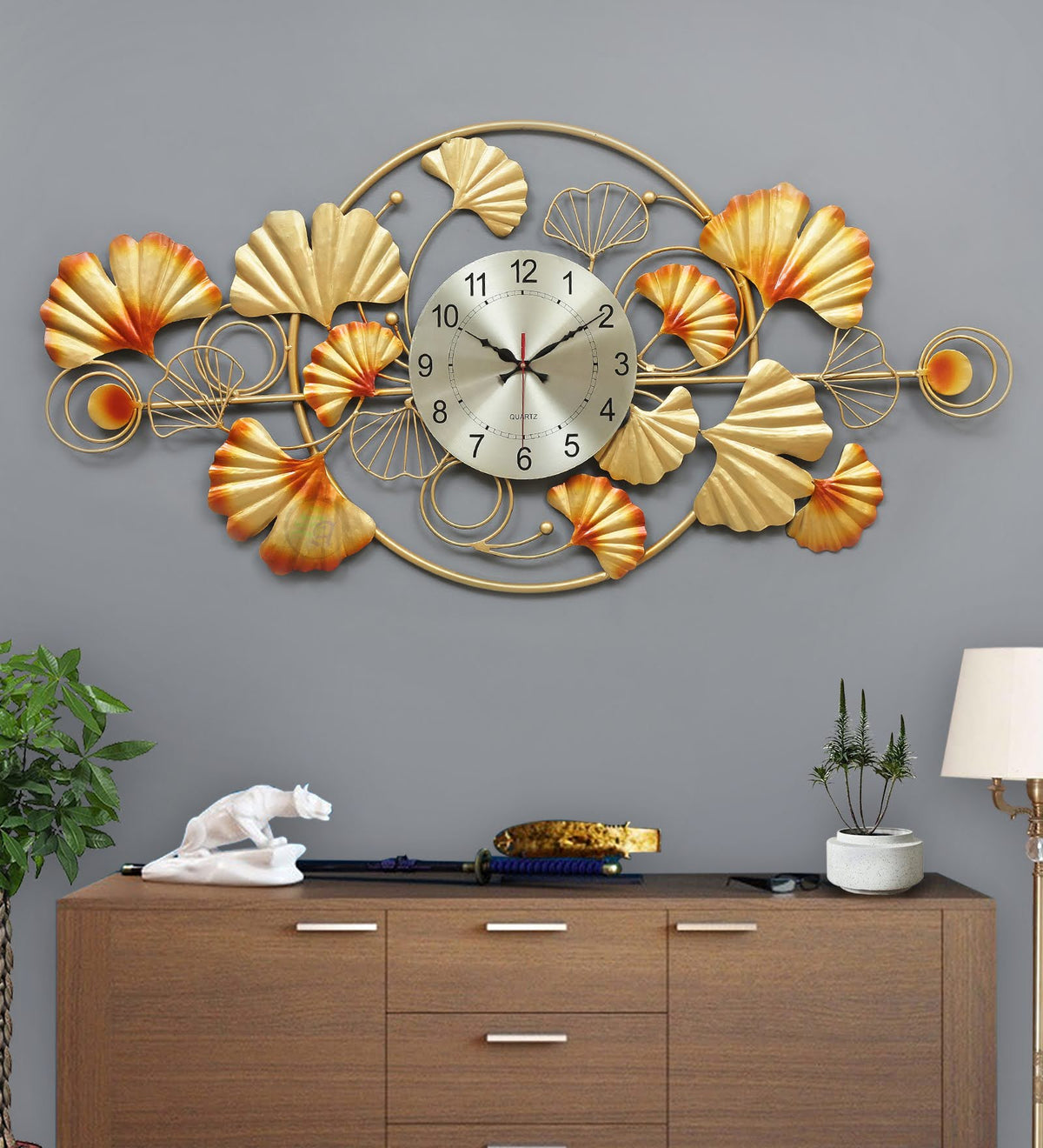 Zara Frame Metal Wall Clock – gold floral wall clock above a console