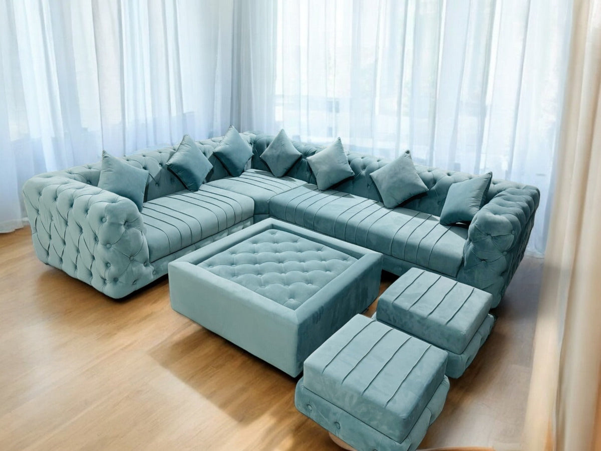 Blue Velvet Sofa Set with Table & Ottomans – set arranged beside curtains